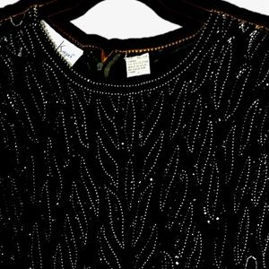 Cocktail dress.  Beaded dress front and back.  Knee length.